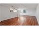 Open-concept living room with hardwood floors and lots of light at 740 N Pearl St # 606, Denver, CO 80203