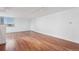 Bright living room with hardwood floors and a large window offering lots of natural light at 740 N Pearl St # 606, Denver, CO 80203