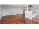 Spacious living room with hardwood floors and ample natural light flowing into the kitchen at 740 N Pearl St # 606, Denver, CO 80203
