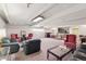Large community lounge area with sitting areas, couches and a dining table at 740 N Pearl St # 606, Denver, CO 80203