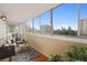 Cozy sun room with comfortable seating and bright city views at 740 N Pearl St # 606, Denver, CO 80203