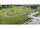Scenic aerial view of green space with walking paths, shelter and convenient parking at 22428 Quail Run Ln, Parker, CO 80138