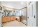 Spacious bathroom with double vanity, soaking tub, and glass-enclosed shower at 22428 Quail Run Ln, Parker, CO 80138