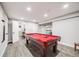 Game room with a full sized billiard table, recessed lighting, and finished flooring at 22428 Quail Run Ln, Parker, CO 80138