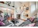 Bright living room with dining area, hardwood floors, and comfortable seating area at 22428 Quail Run Ln, Parker, CO 80138