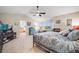 Tranquil main bedroom with lots of light, and an ensuite bathroom in the background at 22428 Quail Run Ln, Parker, CO 80138