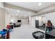 Spacious basement with a recreational area and gym at 14100 Blue Wing Ln, Parker, CO 80134