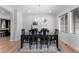 Bright dining area with large windows, stylish lighting, and modern décor at 14100 Blue Wing Ln, Parker, CO 80134