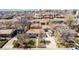 Lovely home with a manicured lawn and mature trees in a charming residential neighborhood at 7977 Durango St, Denver, CO 80221