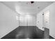 Neutral bedroom with a ceiling fan, ample closet space, and fresh paint at 7977 Durango St, Denver, CO 80221