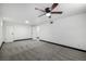 Bedroom featuring neutral carpet, white walls, and great light, ready for personalization at 7977 Durango St, Denver, CO 80221