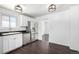 Modern kitchen features stainless steel appliances, ample counter space, and contemporary lighting at 7977 Durango St, Denver, CO 80221