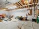 Unfinished basement providing ample storage space, with exposed ceiling and concrete flooring at 6268 Dakota Ridge Dr, Littleton, CO 80125