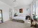Bright bedroom with large windows offering scenic views, ceiling fan, and neutral decor at 6268 Dakota Ridge Dr, Littleton, CO 80125
