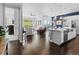 Open-concept floor plan with hardwood floors, a modern kitchen, and a comfortable living area with great outdoor views at 6268 Dakota Ridge Dr, Littleton, CO 80125