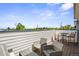 Outdoor balcony with stylish seating and open view of the neighborhood at 1250 W Osceola St # 2, Denver, CO 80204