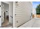 Modern home exterior featuring light siding, visible address, and inviting entrance at 1250 W Osceola St # 2, Denver, CO 80204