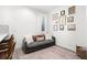 Cozy living room area featuring a comfortable couch, stylish decor, and natural light at 1250 W Osceola St # 2, Denver, CO 80204