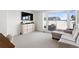 Spacious living room with plush seating, a TV, and a walk out deck at 1250 W Osceola St # 2, Denver, CO 80204