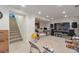 Unfinished basement with a staircase and a carpeted floor, ready for customization at 2246 S Ensenada St, Aurora, CO 80013