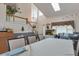 Elegant dining area with a vaulted ceiling and a staircase, perfect for gatherings at 2246 S Ensenada St, Aurora, CO 80013