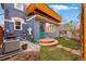 Charming backyard with cozy patio, lush lawn, and privacy fence, creating an inviting outdoor living space at 91 S Sherman St, Denver, CO 80209