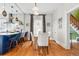 Cozy dining room with wood floors and elegant pendant lighting, perfect for hosting intimate gatherings at 91 S Sherman St, Denver, CO 80209