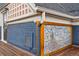 The Starry Night mosaic tile art on exterior wall with wooden deck at 91 S Sherman St, Denver, CO 80209
