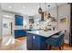 Gorgeous kitchen with a large island, marble countertops, and stainless appliances at 91 S Sherman St, Denver, CO 80209