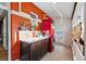 Unique laundry room features a red washer/dryer unit and decorative finishes at 91 S Sherman St, Denver, CO 80209