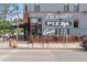 Charming neighborhood eatery featuring decorative signage and flower planters for an inviting atmosphere at 91 S Sherman St, Denver, CO 80209