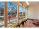 Bright sun room with tiled floors and many windows at 91 S Sherman St, Denver, CO 80209