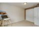 Simple bedroom featuring a closet, modern white trim, and an art easel at 1176 Dales Pony Dr, Castle Rock, CO 80104