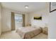 Cozy bedroom with neutral tones, a comfortable bed, and a view of the neighborhood park at 1176 Dales Pony Dr, Castle Rock, CO 80104