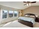 Bright bedroom features large windows offering panoramic views of the surrounding landscape at 1176 Dales Pony Dr, Castle Rock, CO 80104