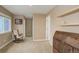 Versatile bonus room with a rocking chair and classic wooden desk offers flexible space at 1176 Dales Pony Dr, Castle Rock, CO 80104
