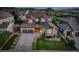 Charming two-story home with stone accents, three-car garage, and landscaped front yard and mountain views at 1176 Dales Pony Dr, Castle Rock, CO 80104