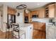 Stylish kitchen with a center island, modern appliances, and plenty of countertop space, perfect for cooking at 1176 Dales Pony Dr, Castle Rock, CO 80104