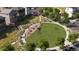 Aerial view of community park with gathering spaces, green spaces, and walking paths at 6562 Arbor Blvd # 4, Thornton, CO 80602