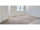 Neutral bedroom offering natural light with plush carpeting, and neutral walls at 6562 Arbor Blvd # 4, Thornton, CO 80602