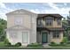 Charming two-story home with a welcoming front porch and professionally landscaped front yard at 1450 Coral Pl, Longmont, CO 80504