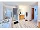 Spacious bathroom with a shower, tub, wood cabinets, and tile flooring at 412 E 131St Ave, Thornton, CO 80241