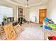 Bedroom features neutral carpet, a large window, a light fixture, and ample space at 412 E 131St Ave, Thornton, CO 80241