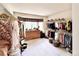 A spacious walk-in closet with custom shelving and storage options and bright light at 412 E 131St Ave, Thornton, CO 80241