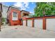 Exterior view of a modern townhome featuring a rooftop terrace at 2138 N Glenarm Pl, Denver, CO 80205