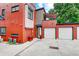 Modern townhome with attached garages, a welcoming entrance and nice curb appeal at 2138 N Glenarm Pl, Denver, CO 80205