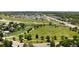 Nice aerial view of community park with walking paths and nearby foliage at 7373 E Iowa Ave # 1124, Denver, CO 80231
