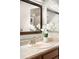 Bathroom featuring a mirror and sink at 7373 E Iowa Ave # 1124, Denver, CO 80231