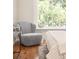 Bedroom chair and light from the window at 7373 E Iowa Ave # 1124, Denver, CO 80231