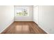 Cozy bedroom with hardwood floors and a bright window at 7373 E Iowa Ave # 1124, Denver, CO 80231